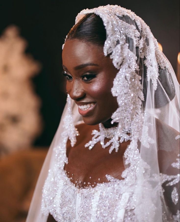 Bride wearing a crystal-embellished veil